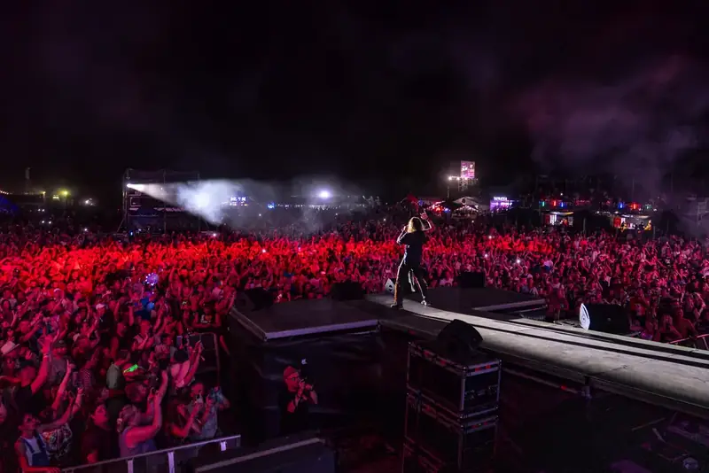 A packed site during a night concert